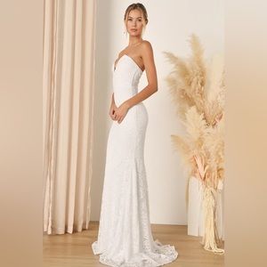 Strapless Maxi Wedding Dress . Size XL. Color is White. NEVER WORN